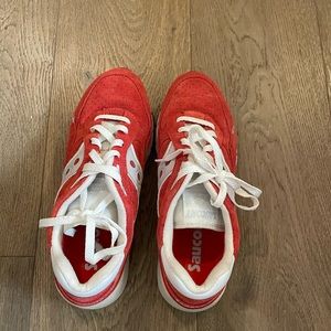 Wore once! Red and White Saucony tennis shoes. Size 8.5, unisex